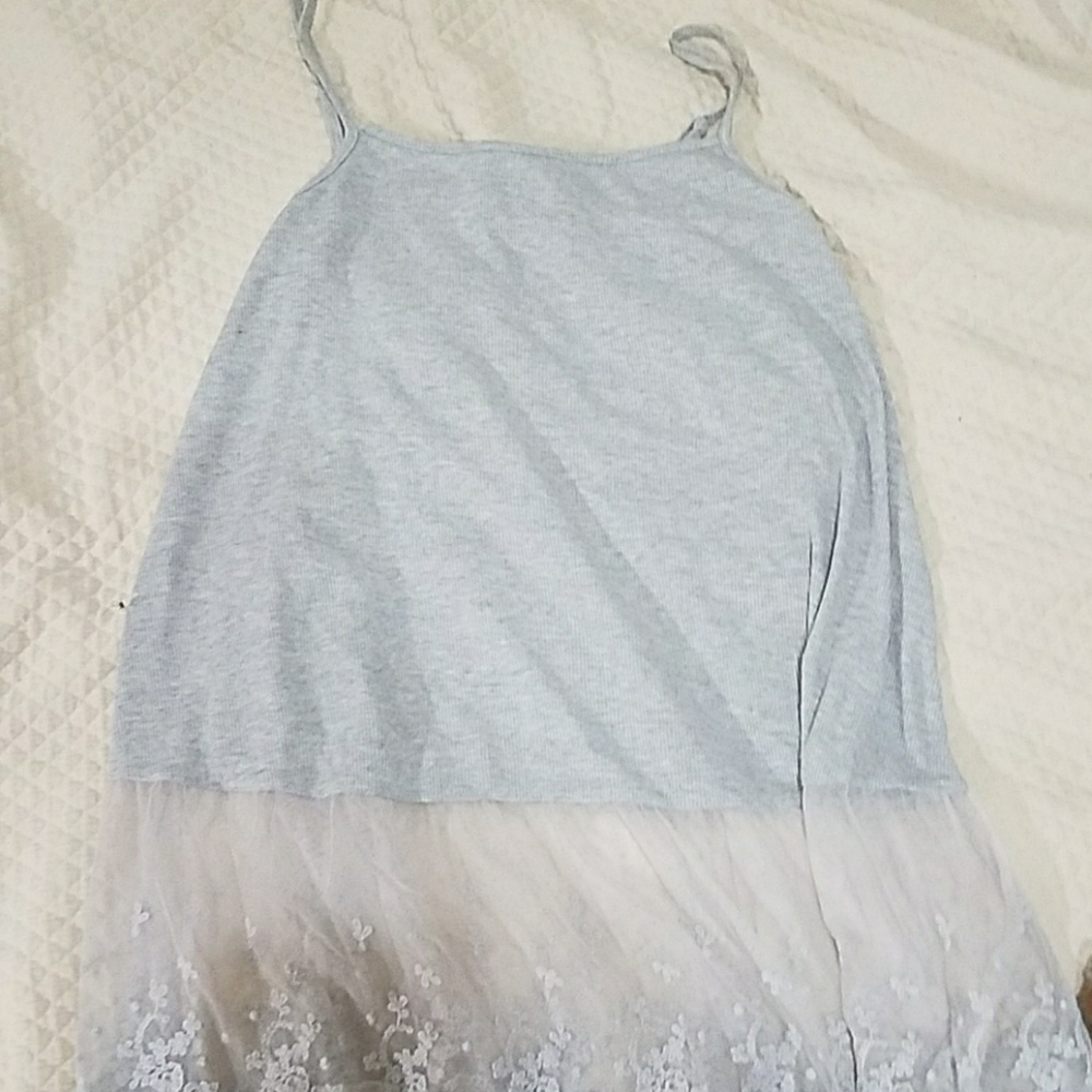A tank with lace detail at the bottom
